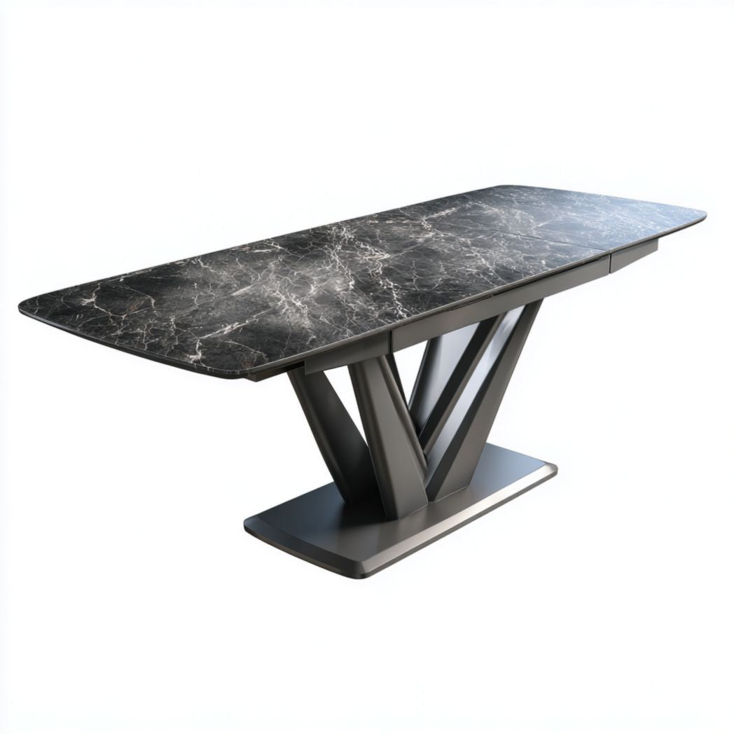 Tavolo da pranzo con piano in marmo nero e base in metallo